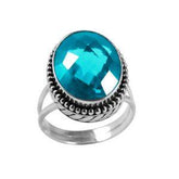 Sterling silver ring with faceted oval Blue Topaz Quartz and Balinese bead details – handcrafted artisan cocktail jewelry.